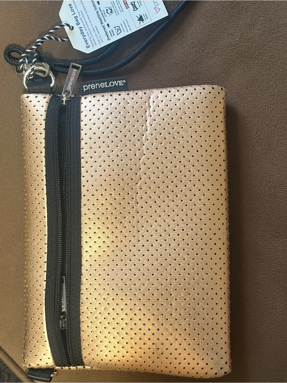 PRENELOVE
 Metallic Gold Perforated Wristlet